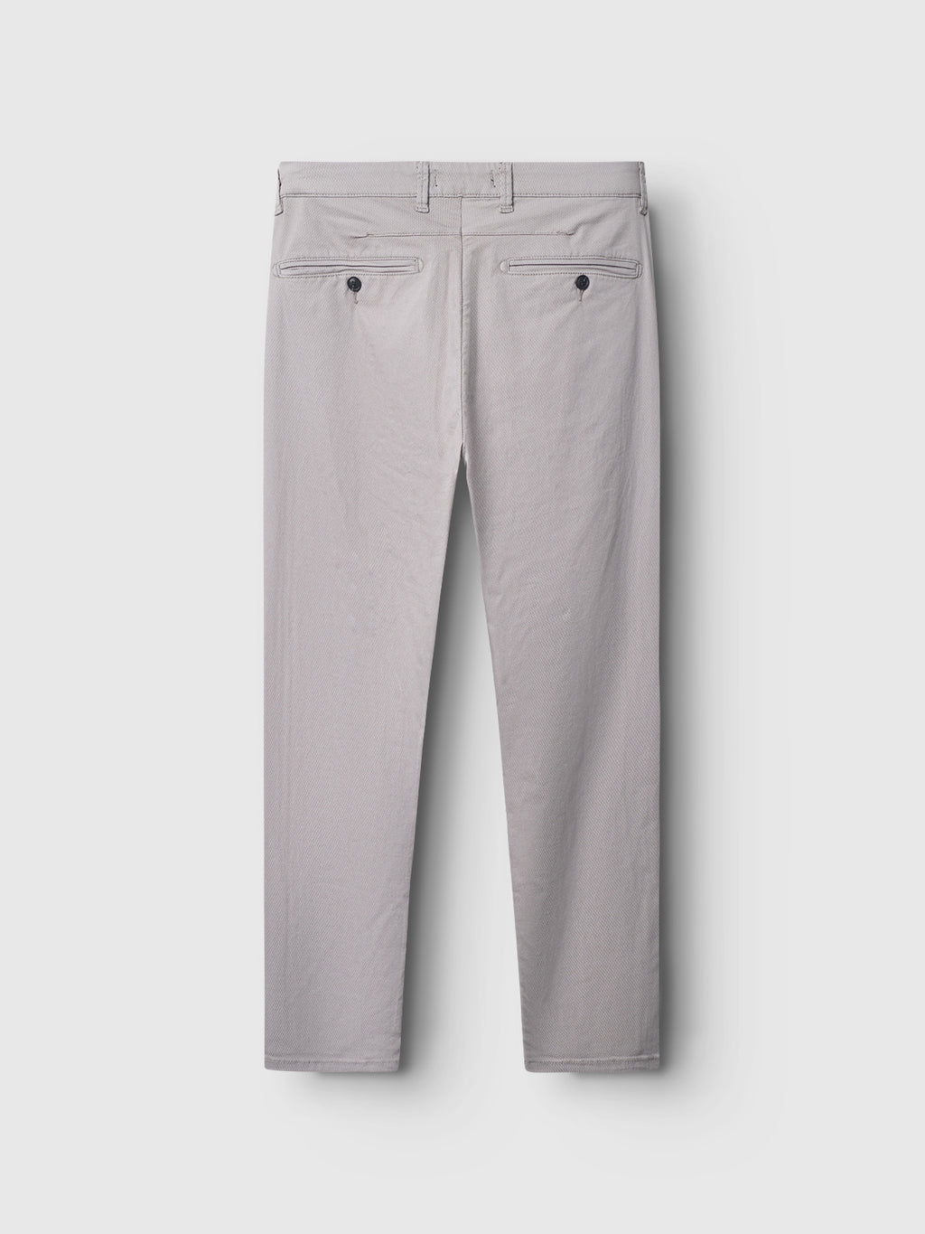 The Gabba GABpaul K3280 Dale Chino in Grey Paloma is shown from the back, highlighting two back welt pockets with black buttons, French pockets, belt loops, and a slim leg opening on a plain white background.