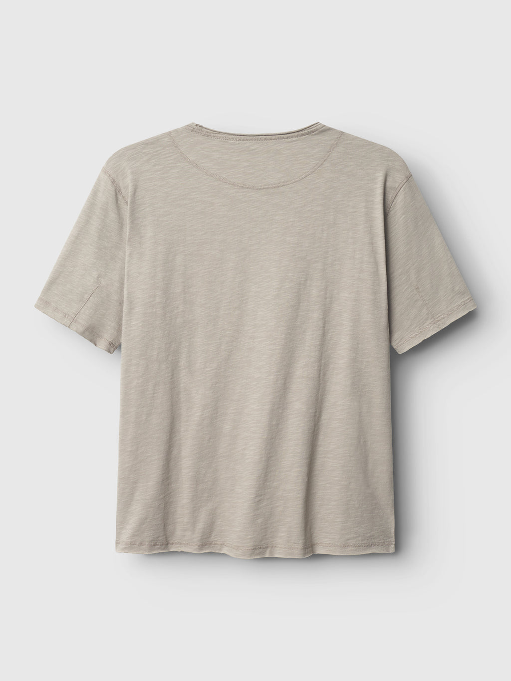 The Gabba GABkostant New SS in Grey Paloma is shown from the back on a white background. This plain short-sleeve tee has a simple crew neck, 100% cotton slub fabric, and no visible designs or logos.