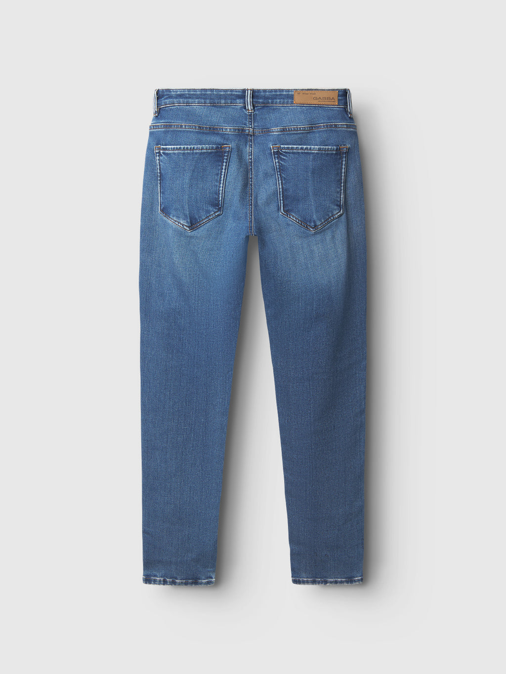 The Gabba GABjones2 Nham RS2113 Jeans in dark blue denim are pictured from the back, highlighting two rear pockets, belt loops, a leather patch on the waistband, and subtle fading on the seat and legs. Crafted from performance stretch denim in a slim straight fit, these jeans combine comfort and style.