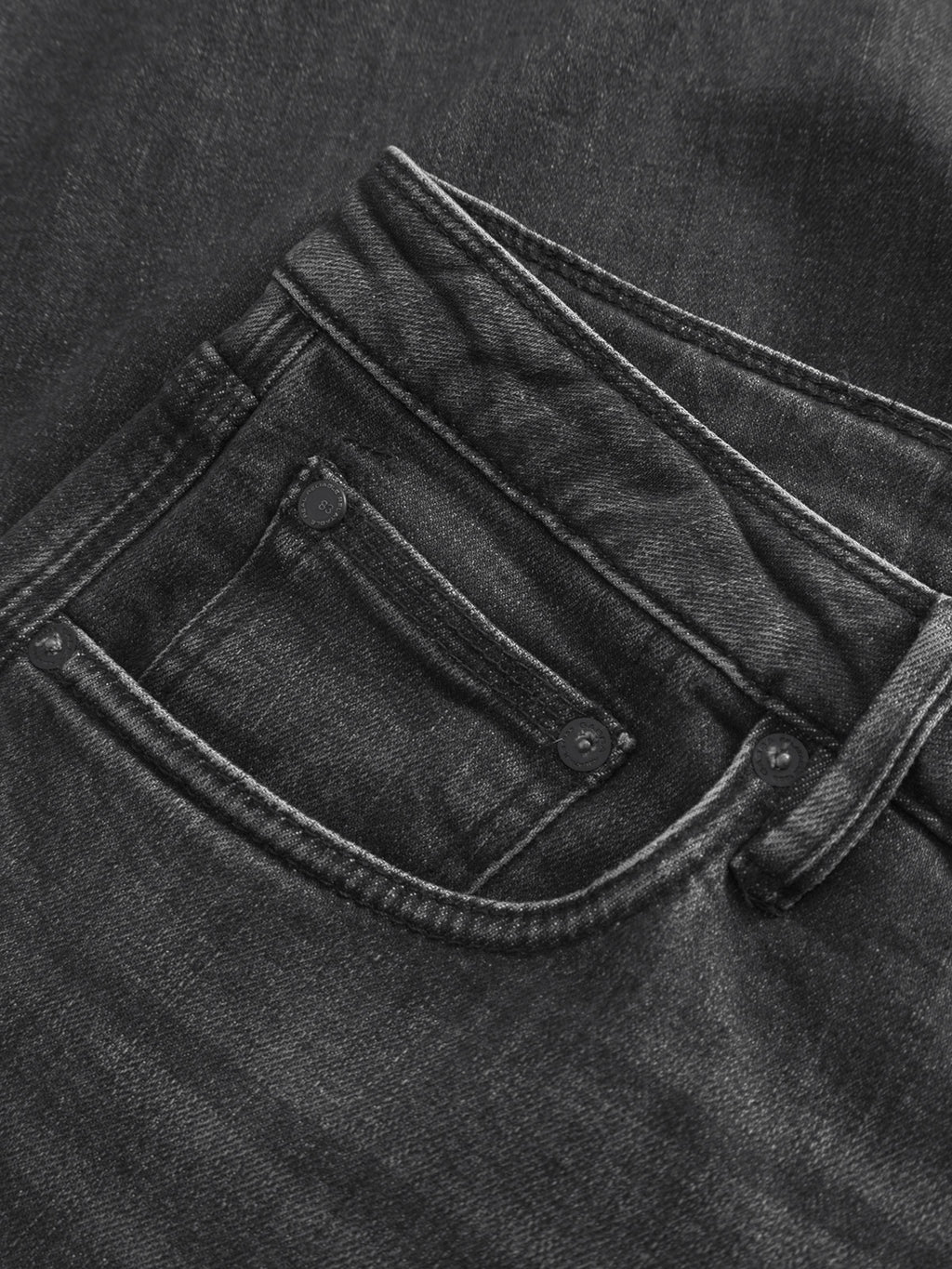 Close-up of the front pocket on Gabba GABmax F1011 - Black Denim jeans, showcasing slim fit design, detailed stitching, rivets, and textured fabric.