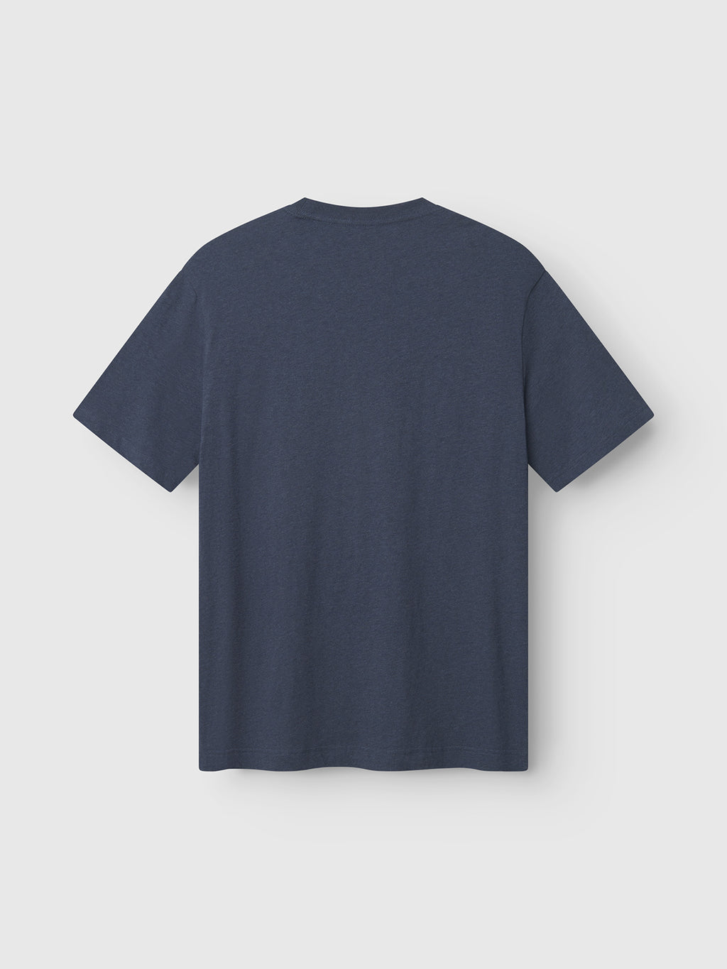 The Dune Melange SS - Navy Mel. t-shirt by Gabba is shown from the back against a white background, featuring a crew neckline, soft fabric, and a clean, minimalist design in navy blue melange jersey.