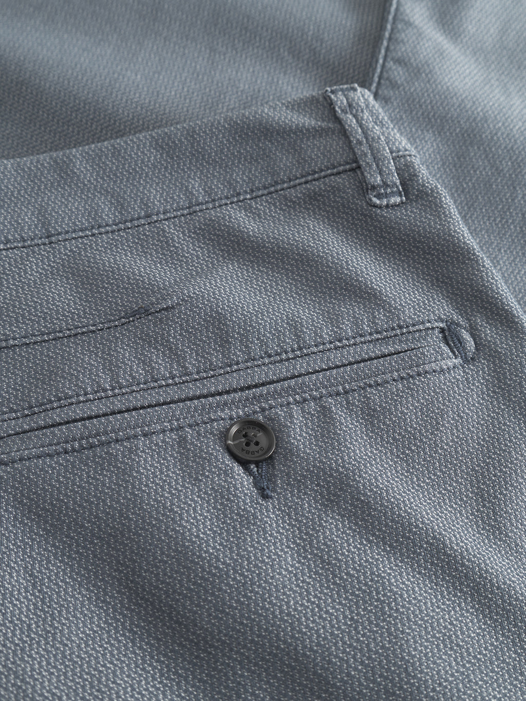 Close-up of the Gabba GABpaul K3280 Dale Chino in blue, showcasing textured fabric, French front pockets, and a buttoned double-paspel back pocket with visible stitching.