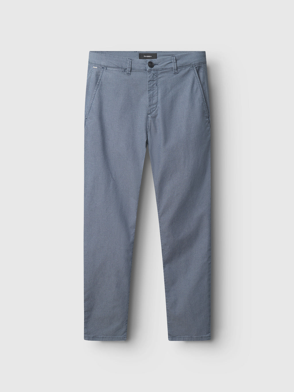 The GABpaul K3280 Dale Chino - Blue by Gabba is showcased on a flat background in a light blue hue. Crafted from a high-stretch cotton-blend for all-day comfort, these versatile slim chino pants feature front pockets, belt loops, and a button closure at the waist—making them perfect for everyday wear.