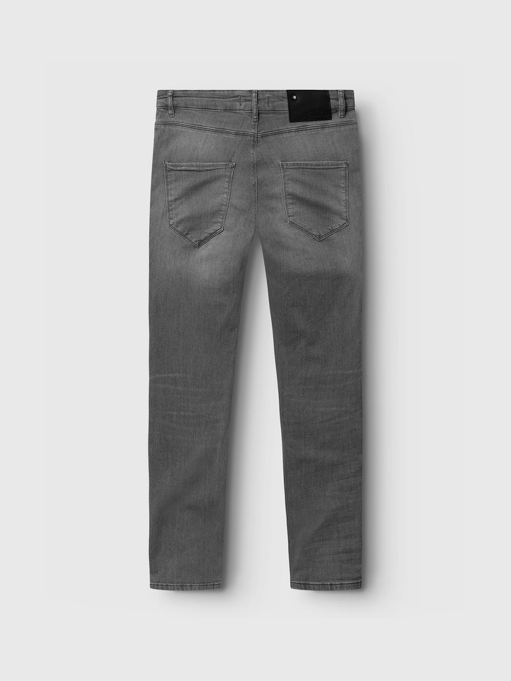Back view of GABBA's GABrey K3454 - Denim wash gray slim fit jeans laid flat on a white background, showing two back pockets and a black waistband label.