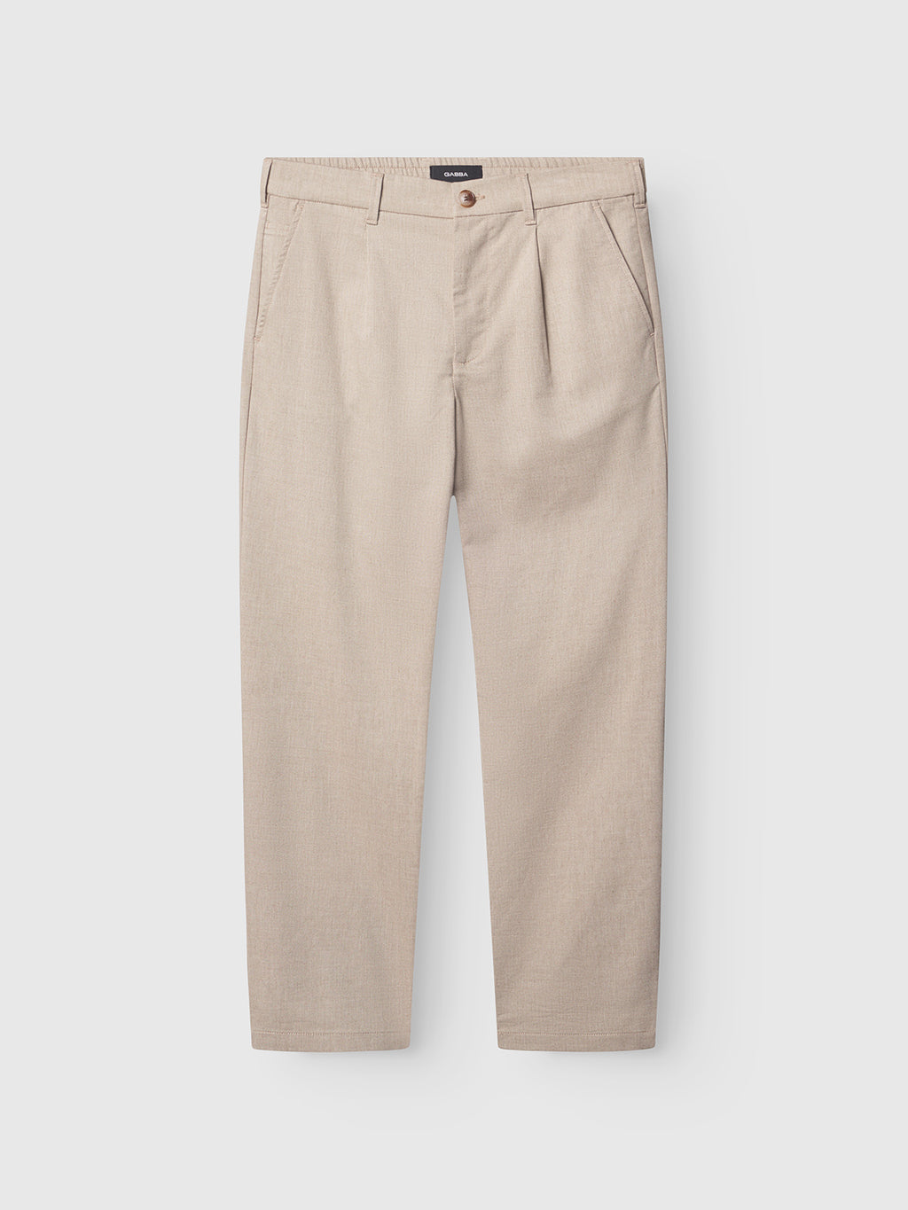 Napoli 19 Carre - Sand pants by Gabba, crafted from beige cotton with pleats, side pockets, and belt loops, are displayed flat on a white background. These classic-style trousers feature a button and zip closure at the waist.