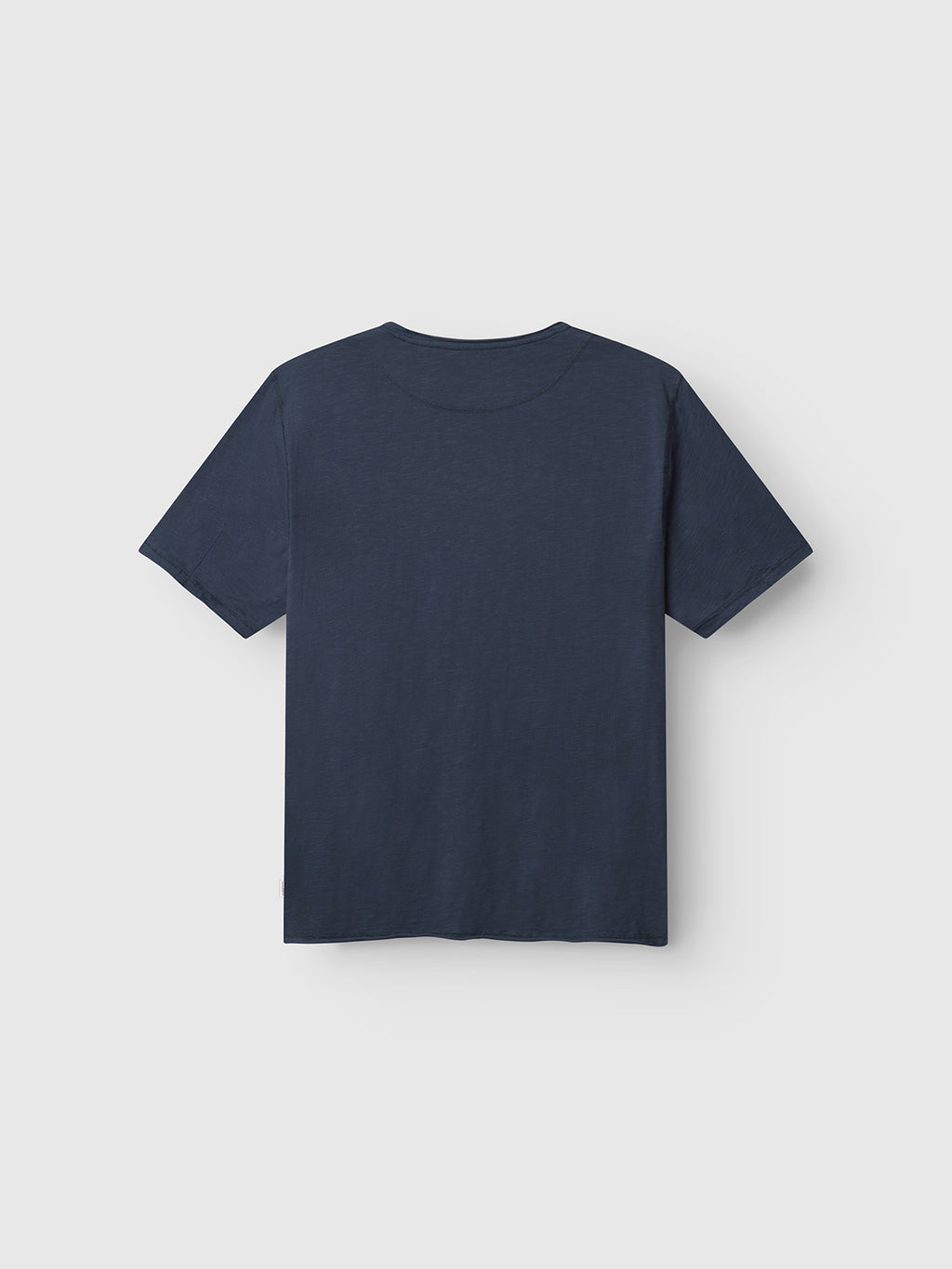 The Gabba GABkostant New SS navy short-sleeve slub t-shirt is displayed from the back, laid flat on a light gray background.