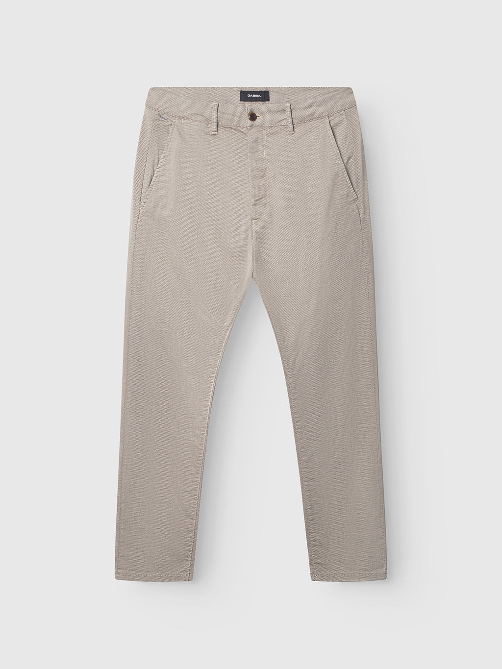 The GABBA GABpaul K3280 Dale Chino in Humus is a pair of light beige slim-fit pants made from a high-stretch cotton-blend, featuring side pockets and a button closure—shown flat on a white background and ideal for everyday wear.