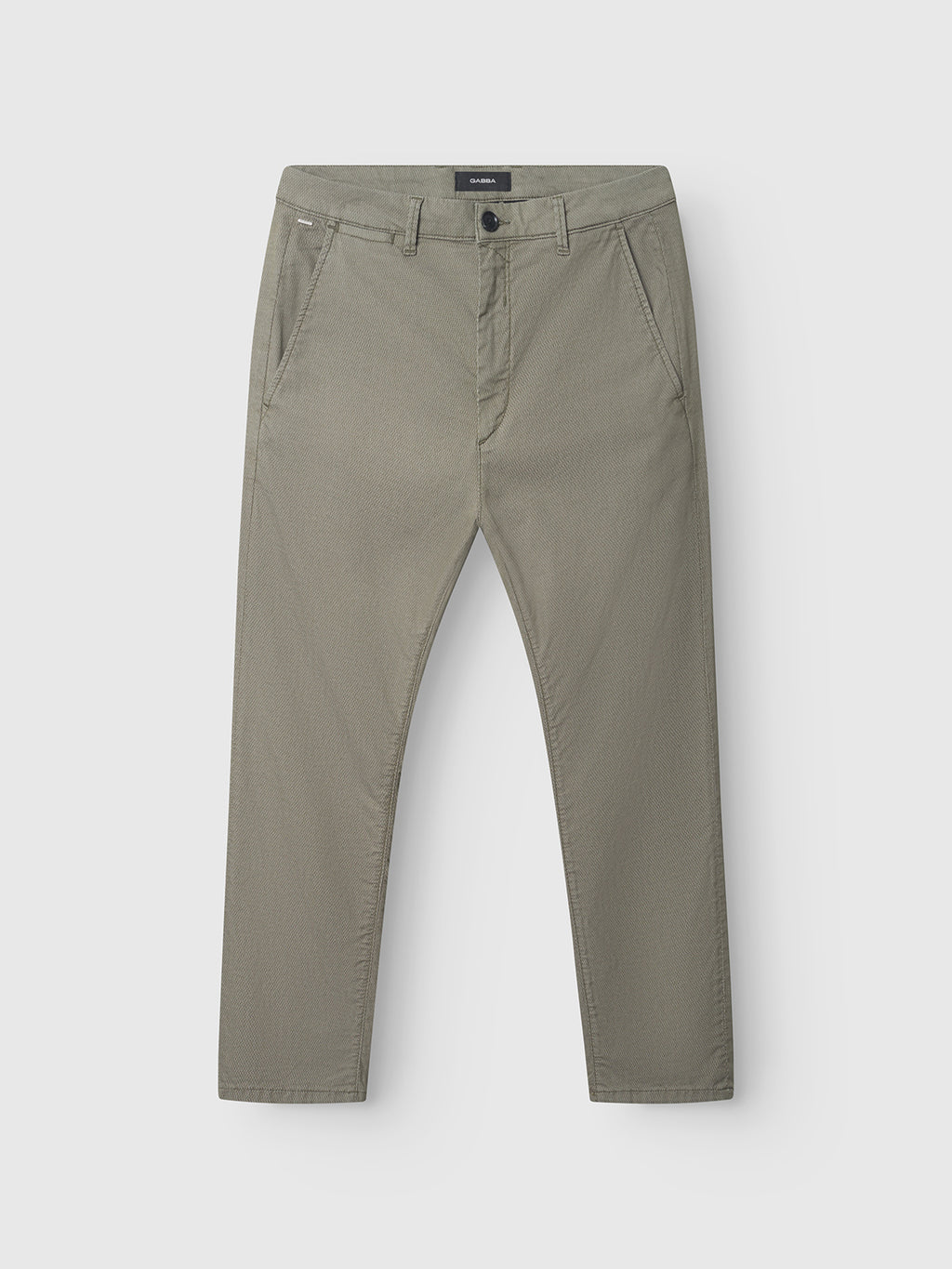 The Gabba GABpaul K3280 Dale Chino in Olive Green is a pair of slim-fit chinos, crafted from a high-stretch cotton blend for exceptional comfort. Featuring a button and zip fly, front slant pockets, and back welt pockets, these versatile trousers are shown laid flat on a white background—ideal for everyday wear.