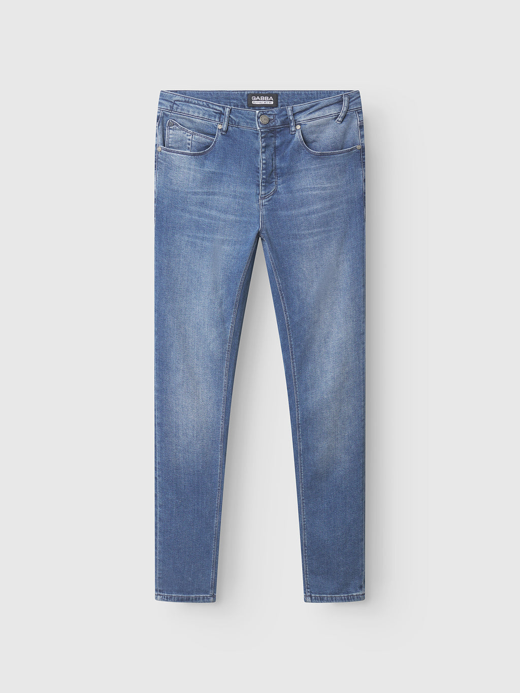 The GABBA GABrey K3866 TENCEL™ Jeans in a denim wash feature a slim fit and classic five-pocket design, shown laid flat on a white background—ideal for creating an effortlessly relaxed style.