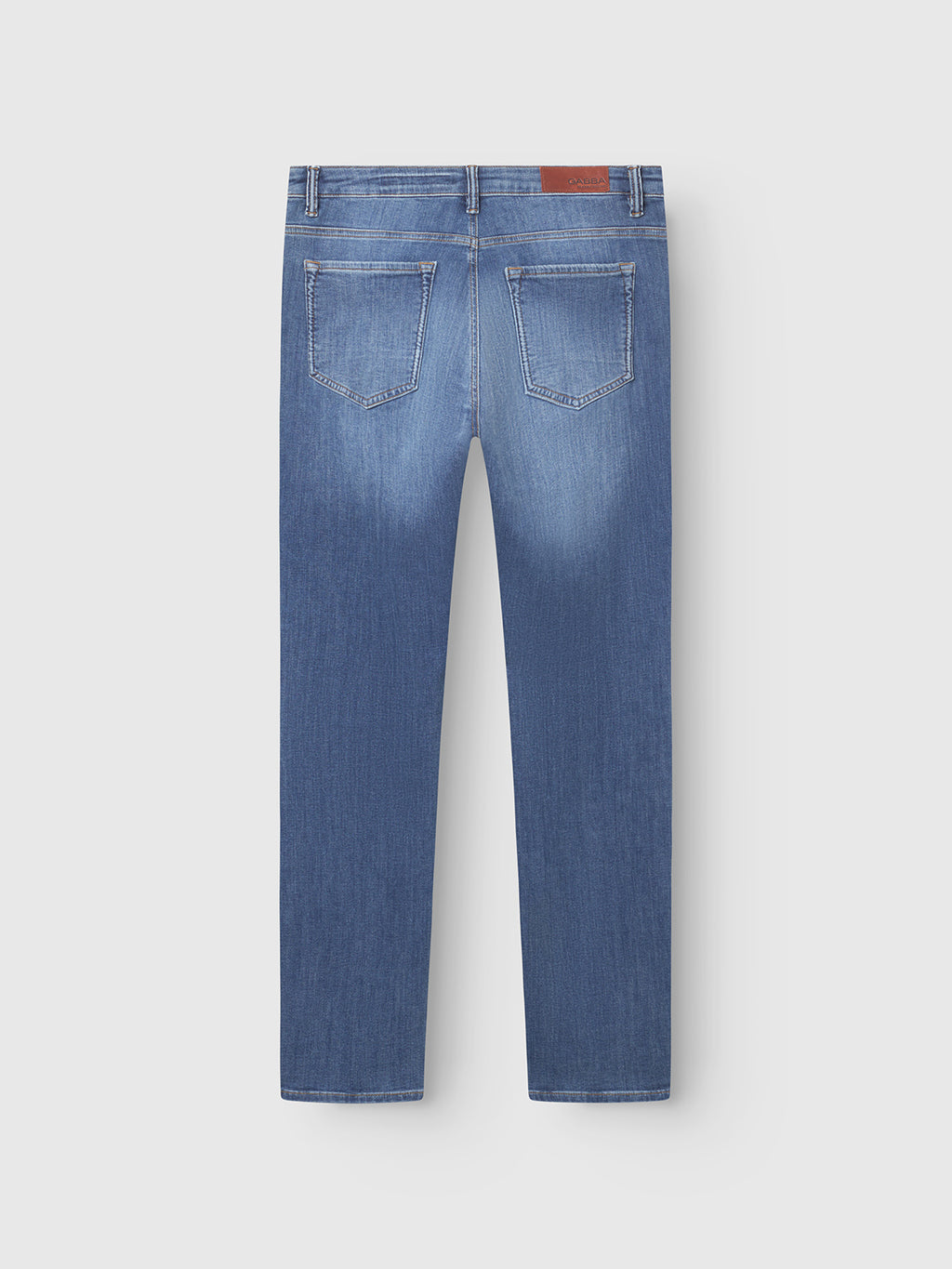 Gabba GABjones Vanew jeans in mid blue denim, shown from the back, feature two back pockets, belt loops, a brown leather patch on the waistband, and are crafted from super-stretch fabric for high flexibility and all-day comfort.