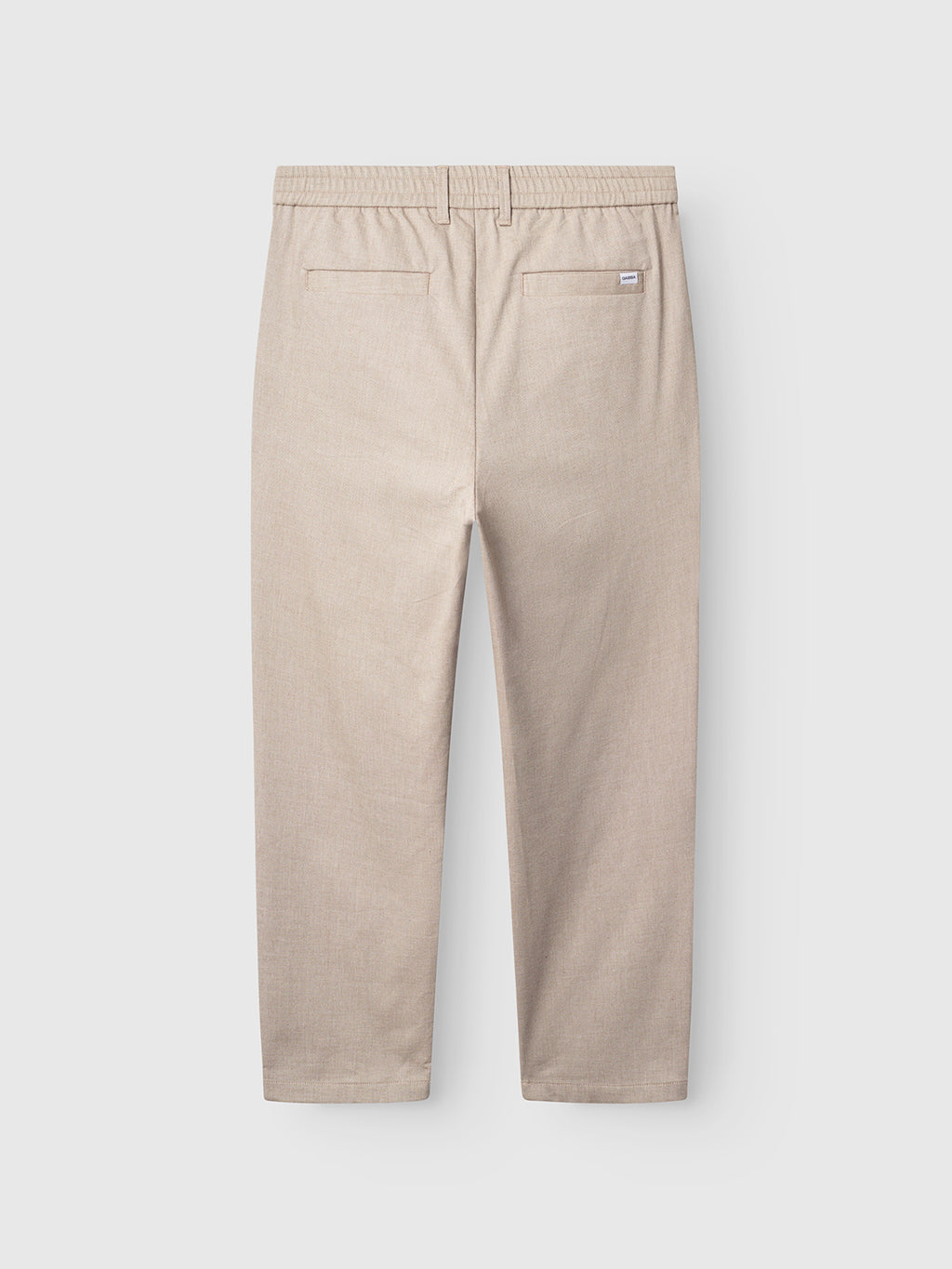 Gabba’s Napoli 19 Carre - Sand pants shown from the back, featuring an elastic waistband, two back welt pockets, and a small brand tag above the right pocket for a comfortable, classic look.