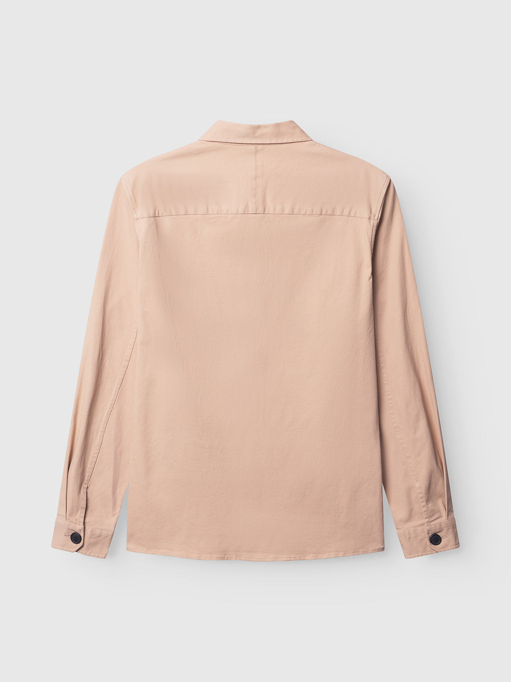 The GABBA GABtopper LS Shirt in Humus is shown from the back, featuring a light beige color, classic shirt collar, black cuff buttons, long sleeves, and a straight hem for a simple look.