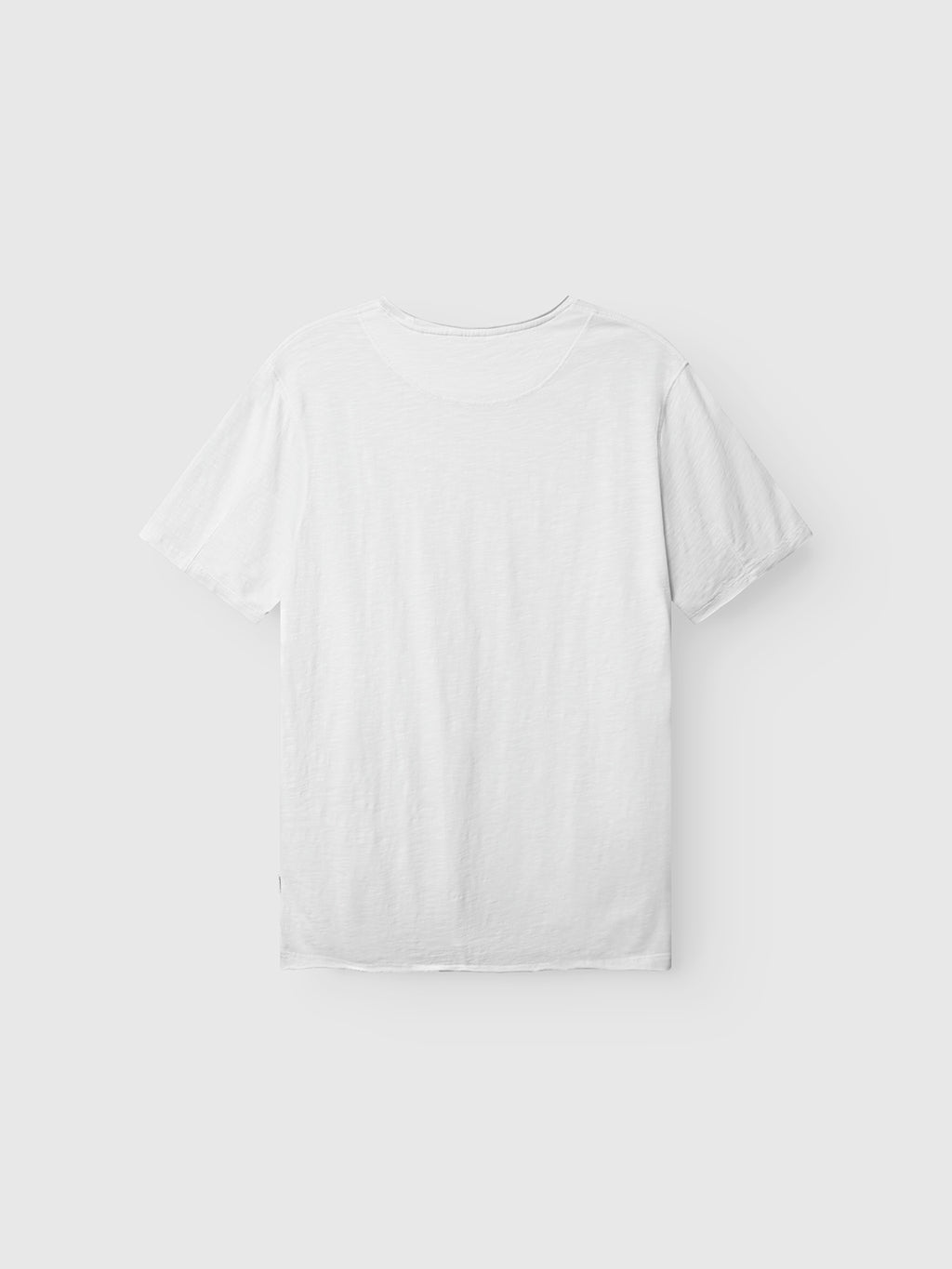 The Gabba GABkostant New SS t-shirt in white, made from slub fabric with short sleeves, is displayed flat and shown from the back on a light gray background.