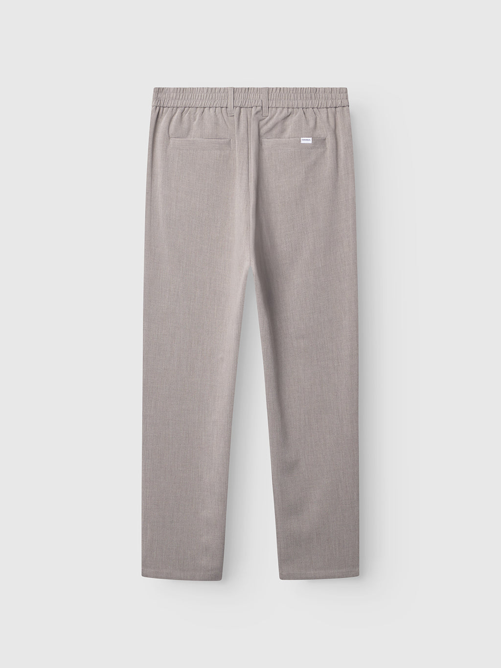 GABnapoli 19 Phin GRS - Sand by Gabba are light grey wool blend chino dress pants featuring an elastic waistband and two back pockets, one detailed with a small white tag. Made with recycled polyester for enhanced sustainability, these regular straight fit pants are shown flat on a plain white background with the back side visible.