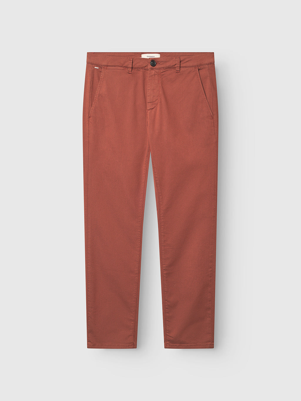 The Gabba GABpaul K3280 Dale Chino in Brown Rust features a slim fit, slim leg opening, French front pockets, back pockets, button closure, and belt loops, shown on a white background.