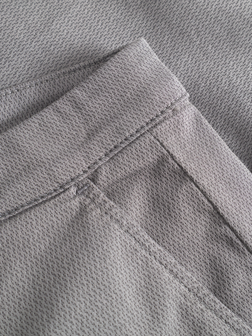 Close-up of the Gabba GABpaul K3280 Dale Chino in Dust Sage Green, showcasing its textured fabric, elastic waistband, French pockets, and detailed side pocket stitching.