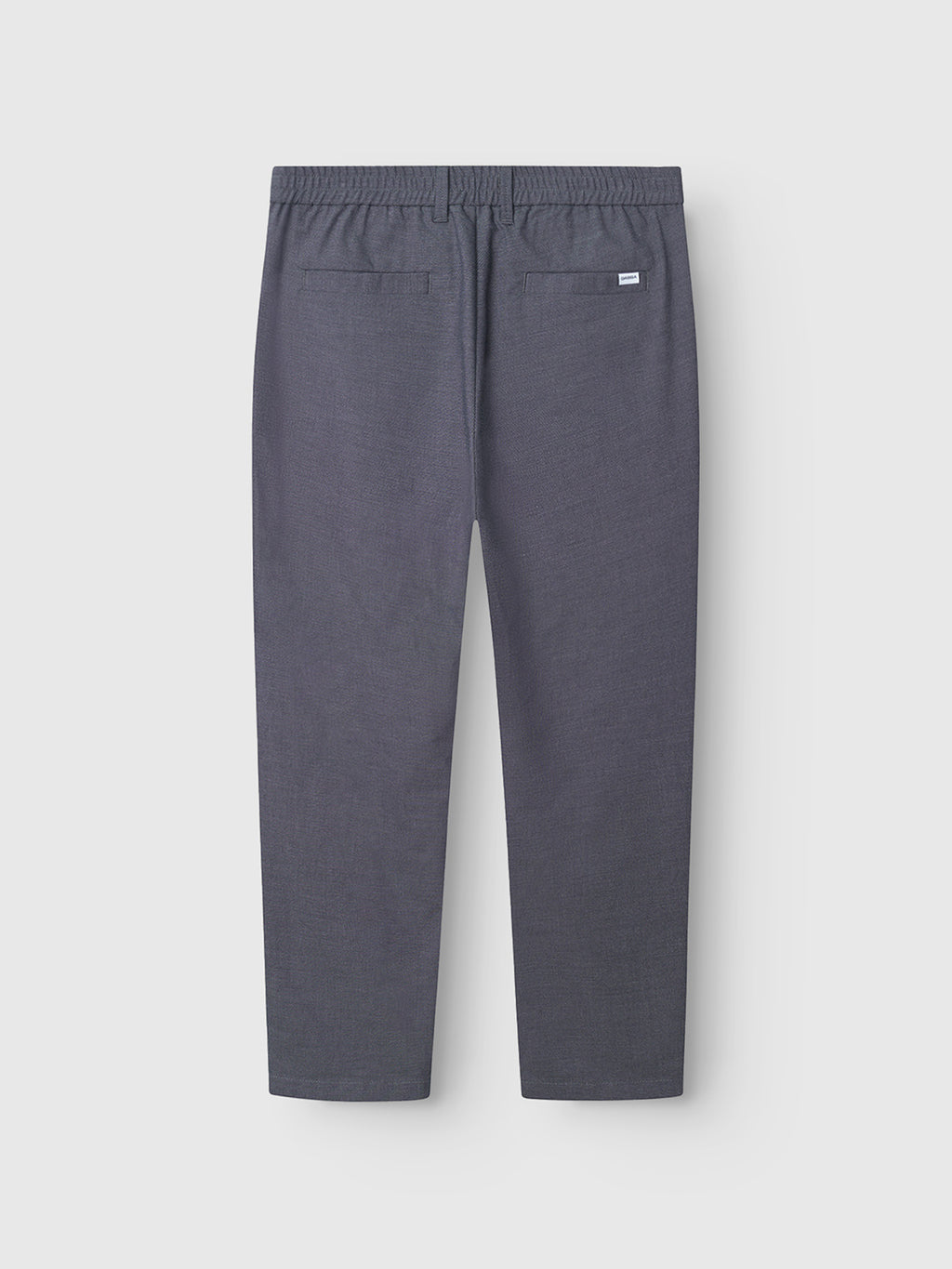 Back view of Gabba's Napoli 19 Carre pants in navy, featuring classic style with an elastic waistband and two rear welt pockets, offering comfort and displayed against a plain white background.
