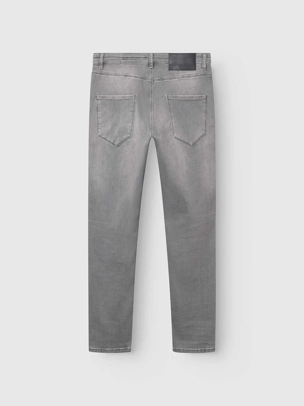 Back view of GABBA GABrey K3454 - Denim wash slim fit jeans in light gray, featuring two rear pockets, belt loops, and a black leather patch on the waistband, displayed against a plain white background.