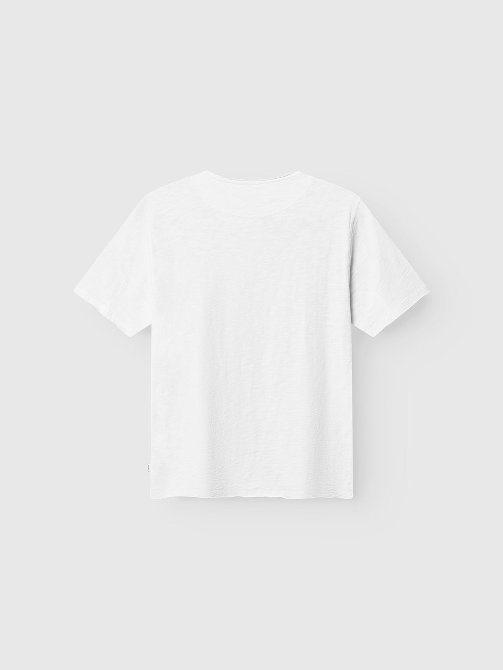 The Gabba GABkostant New SS t-shirt in white, crafted from 100% cotton slub fabric, is displayed from the back against a light gray background.
