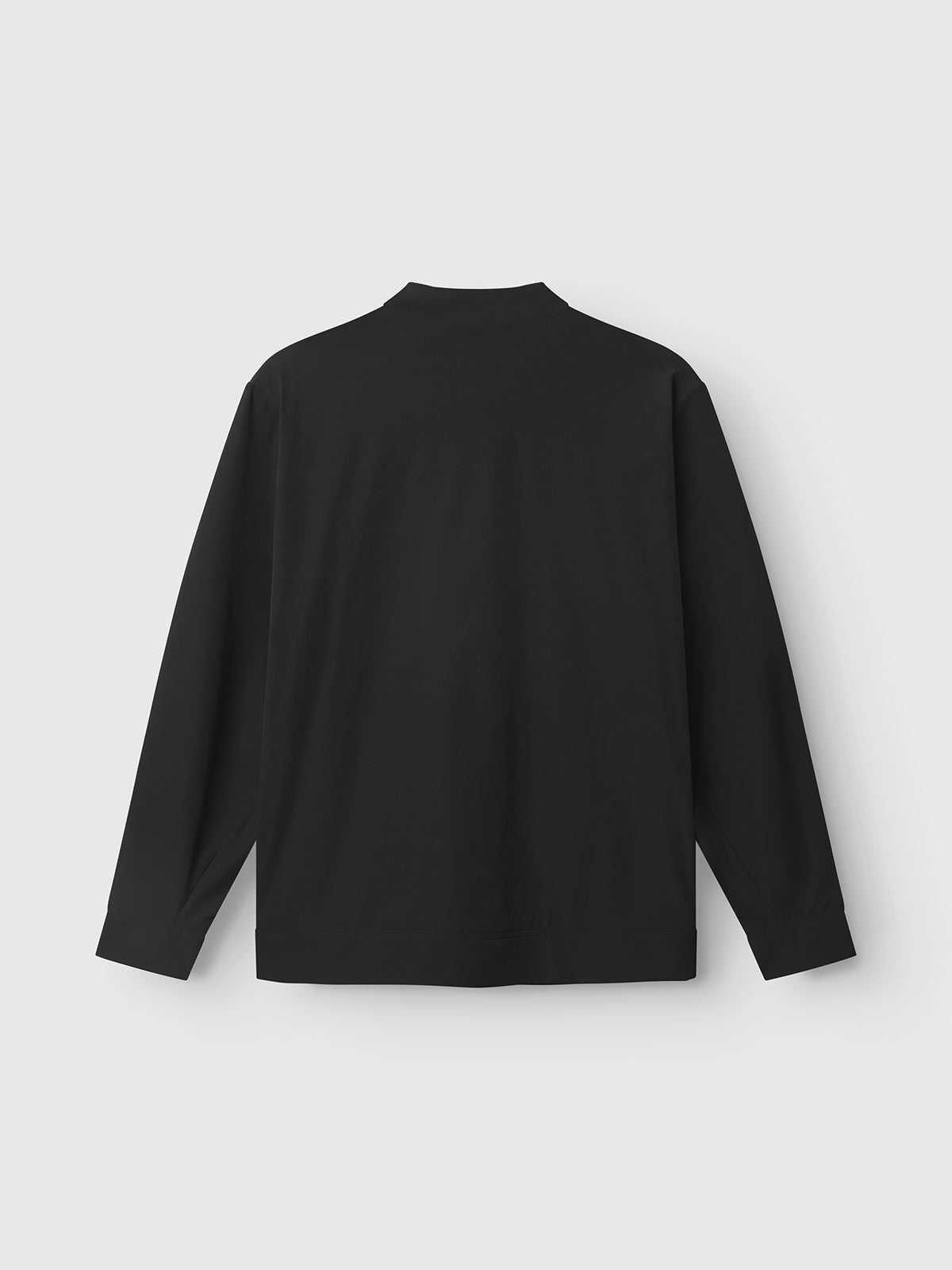 The GABnik Tech - Black by Gabba is a plain black long-sleeve shirt with a simple, practical design, shown from the back on a light background without any visible logos, patterns, or extra details.