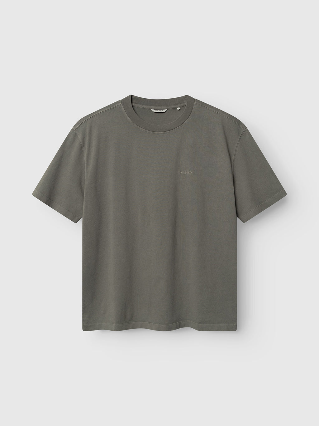 The Gabba GABnigel Wix Boxy Hour SS t-shirt in Castor Gray features a heavyweight cotton, short-sleeved, crew neck boxy fit and is displayed against a light gray background.