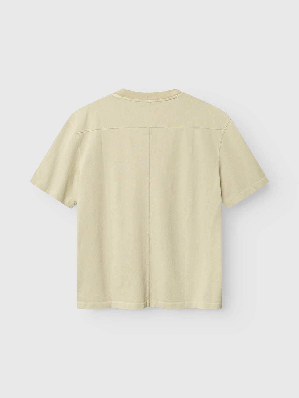 The Gabba GABnigel Wix Boxy Hour SS in Alfa Green is shown from the back on a white background. This heavyweight cotton t-shirt has short sleeves, a boxy fit, straight hem, and seam detailing across the upper back and center.