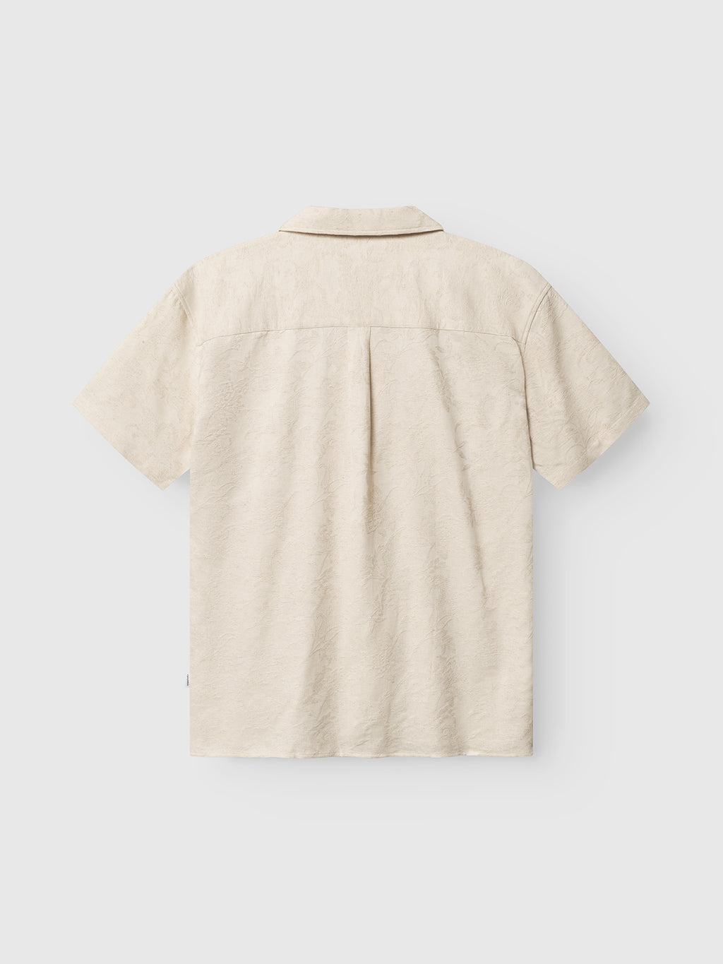 The GABjens Over Resort Soft SS Shirt by Gabba in ecru is shown from the back against a plain white background, featuring short sleeves, a resort collar, subtle textured pattern, and a relaxed fit.