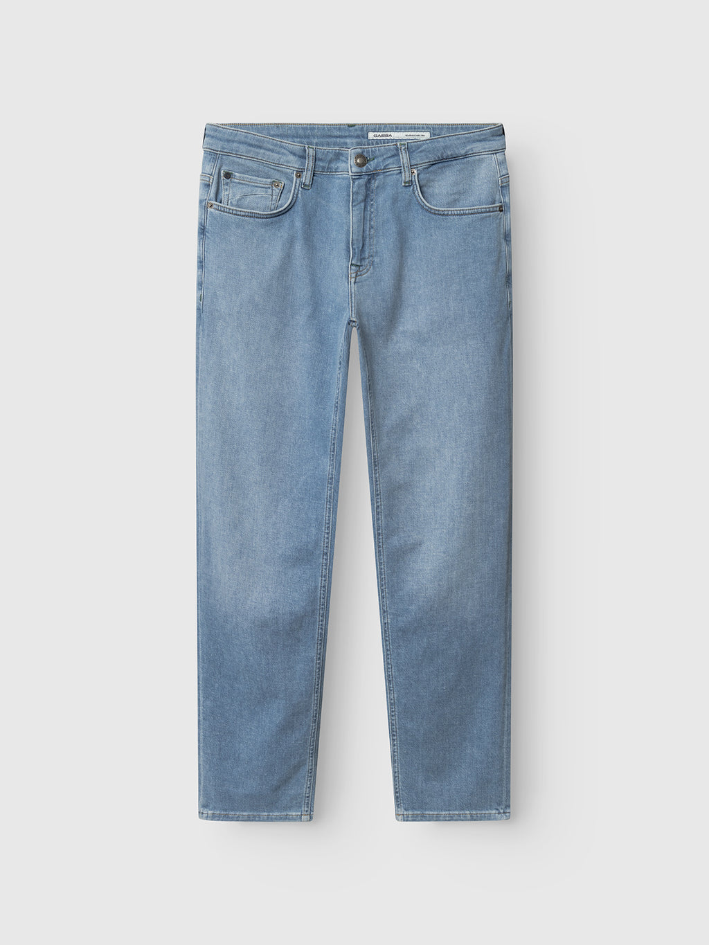 The Gabba GABmarc Hobok Jeans in mid blue denim feature a straight-leg cut, classic five-pocket design, and button closure. Made from regenerative cotton, these stretch jeans are shown against a plain white background.