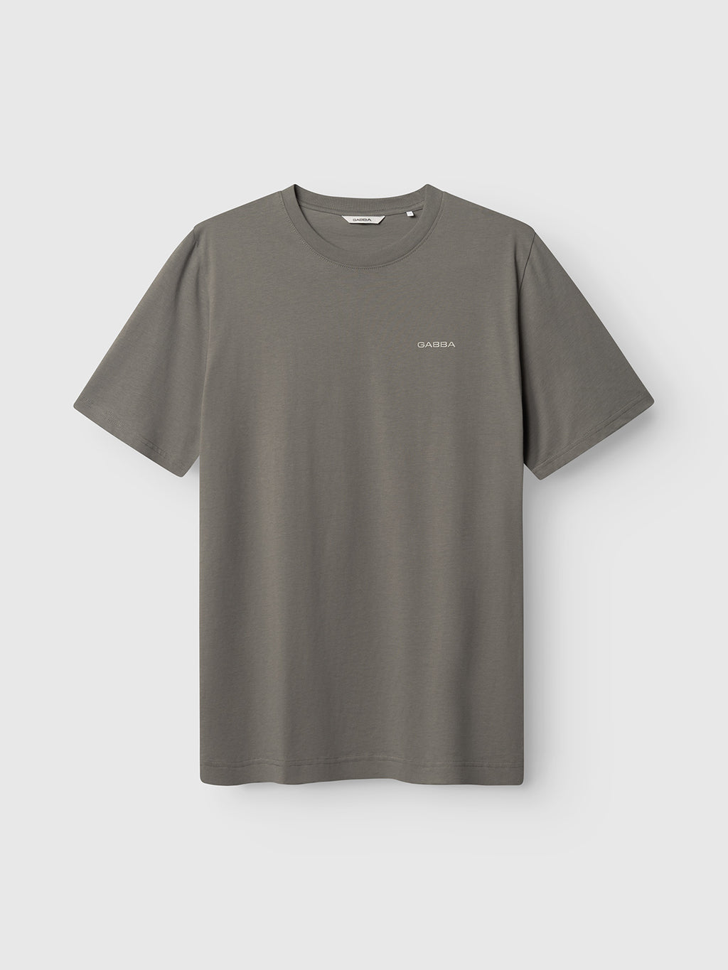 The Gabba GABdune Logo GOTS SS T-Shirt in Castor Gray is a classic fit, short-sleeved tee made from soft organic cotton with a small logo on the left chest, shown against a white background.