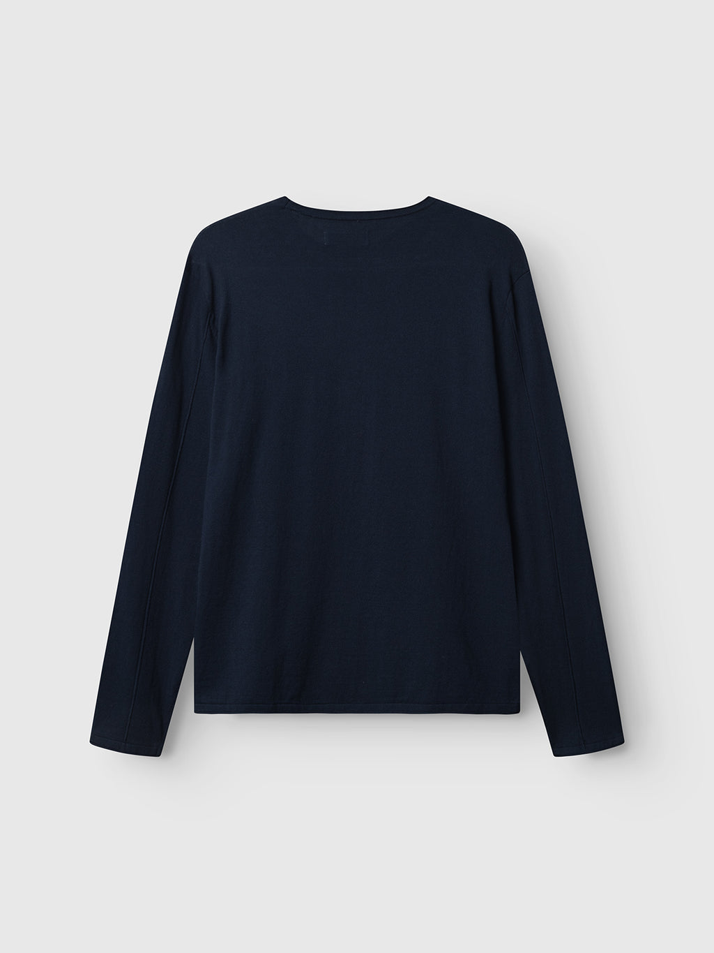 The Gabba GABlima Cot LS Knit in navy is a plain, long-sleeved cotton t-shirt shown from the back on a light gray background.