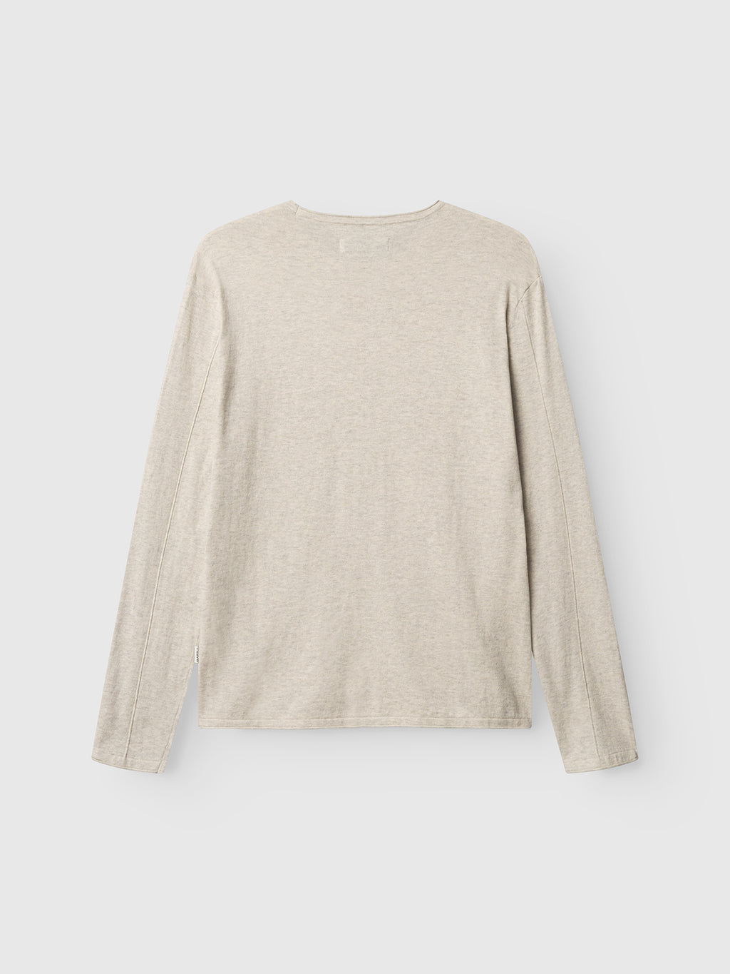 The Gabba GABlima Cot LS Knit - Sand Mel. is a regular fit, long-sleeved knit shirt in light beige, shown laid flat from the back against a white background.