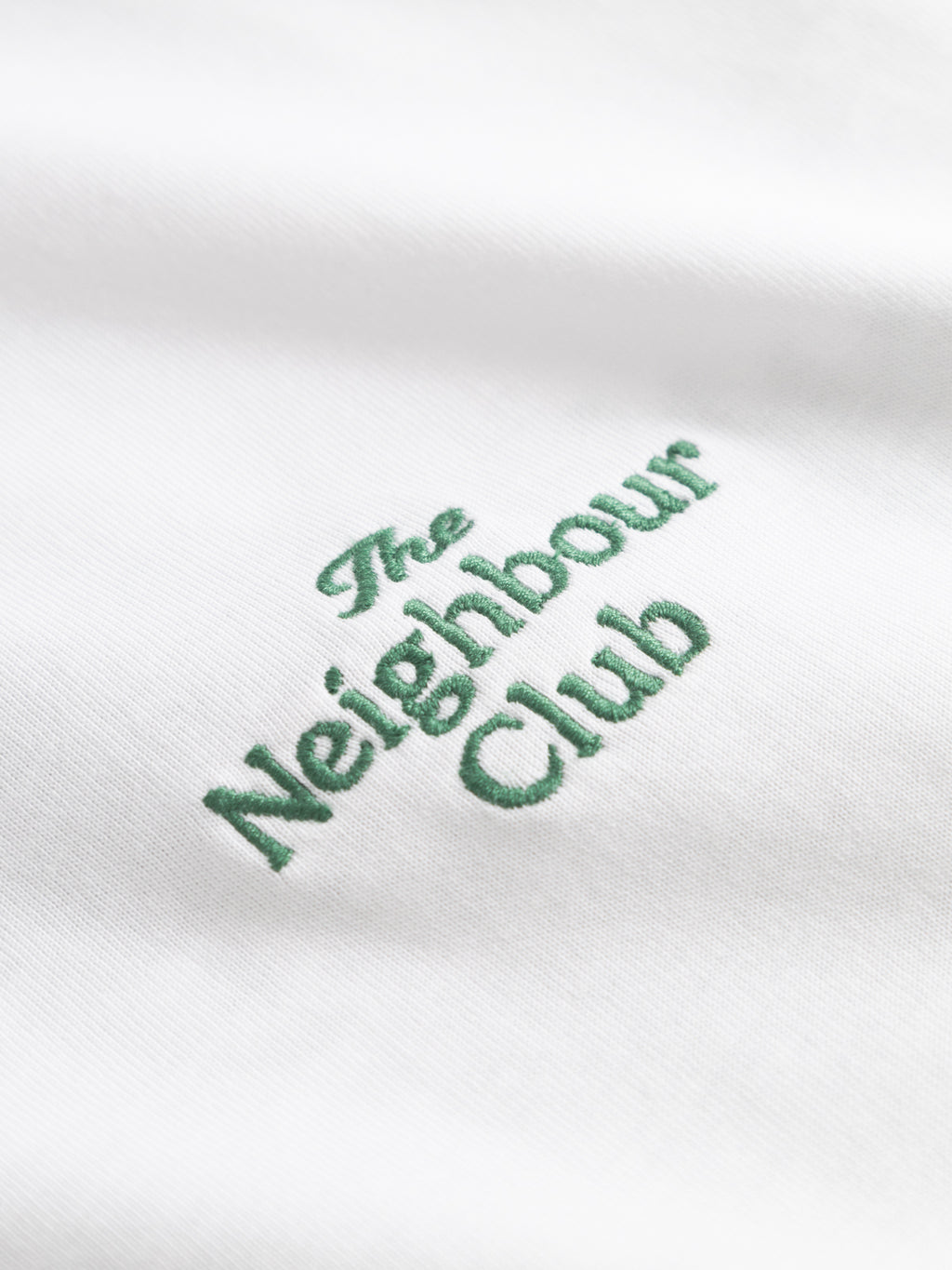 Close-up of green embroidered 