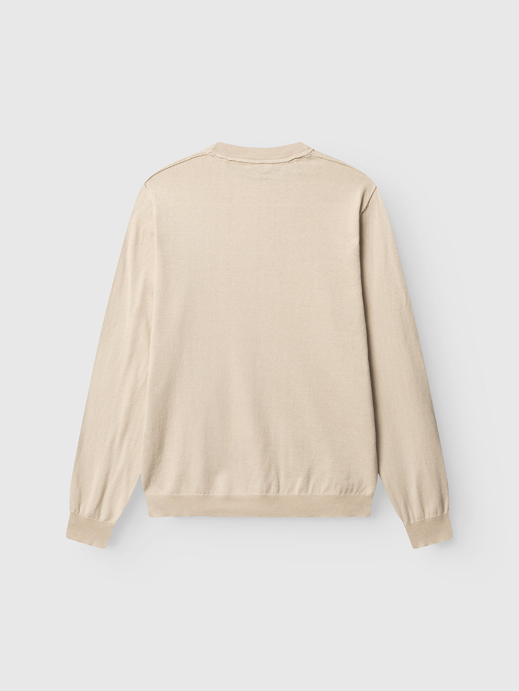 The Gabba GABfumo Spy LS Knit in Sand is a plain, long-sleeved sweatshirt with a regular fit, shown laid flat with the back up. It features soft cotton, a crew neckline, and ribbed cuffs and hem against a white background.