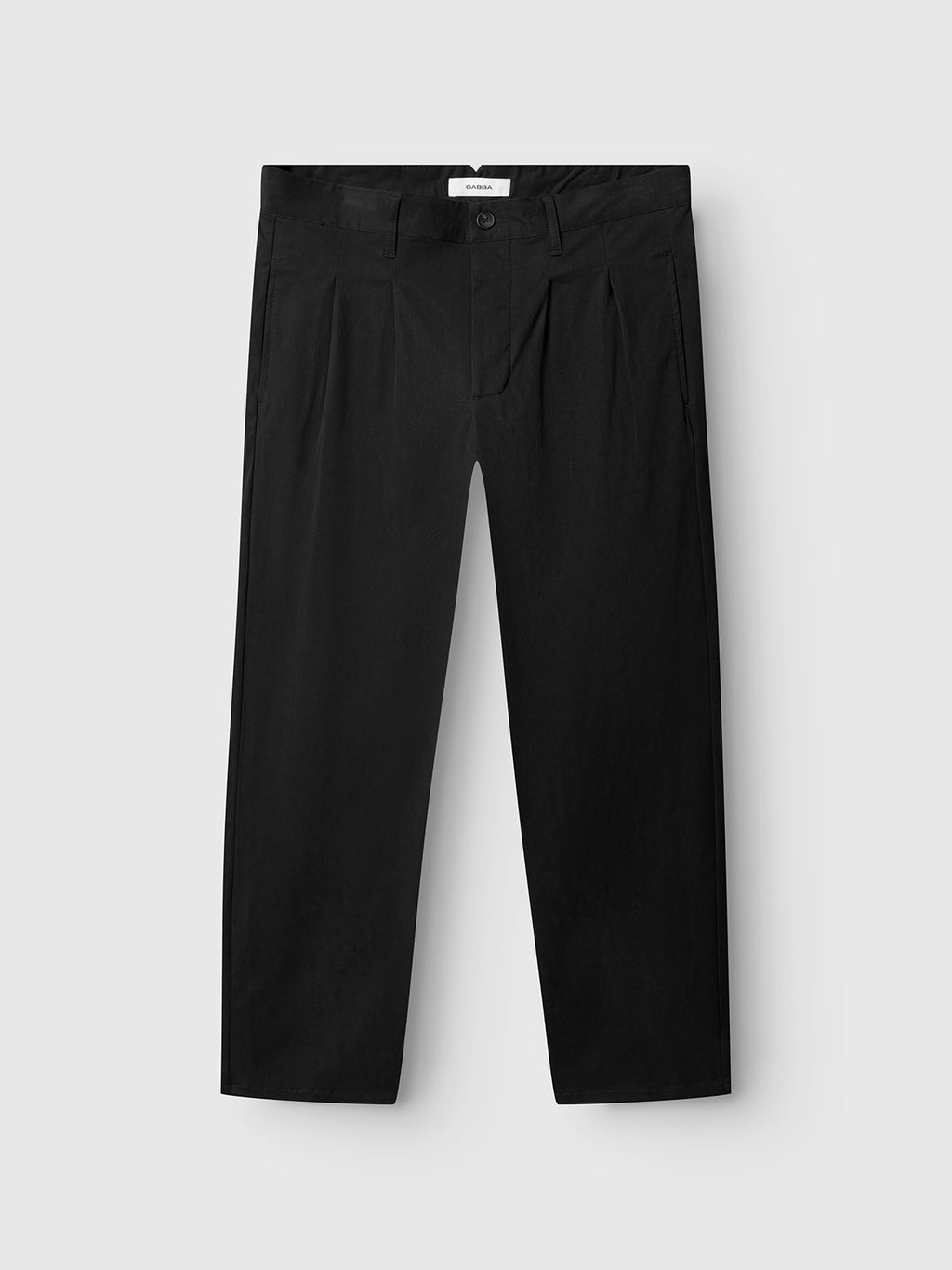 A pair of Gabba GABfirenze Bolu Cropped TENCEL™ Pants in black, featuring a button and zipper closure, pleated front, straight legs with a relaxed fit, laid flat on a light gray background.