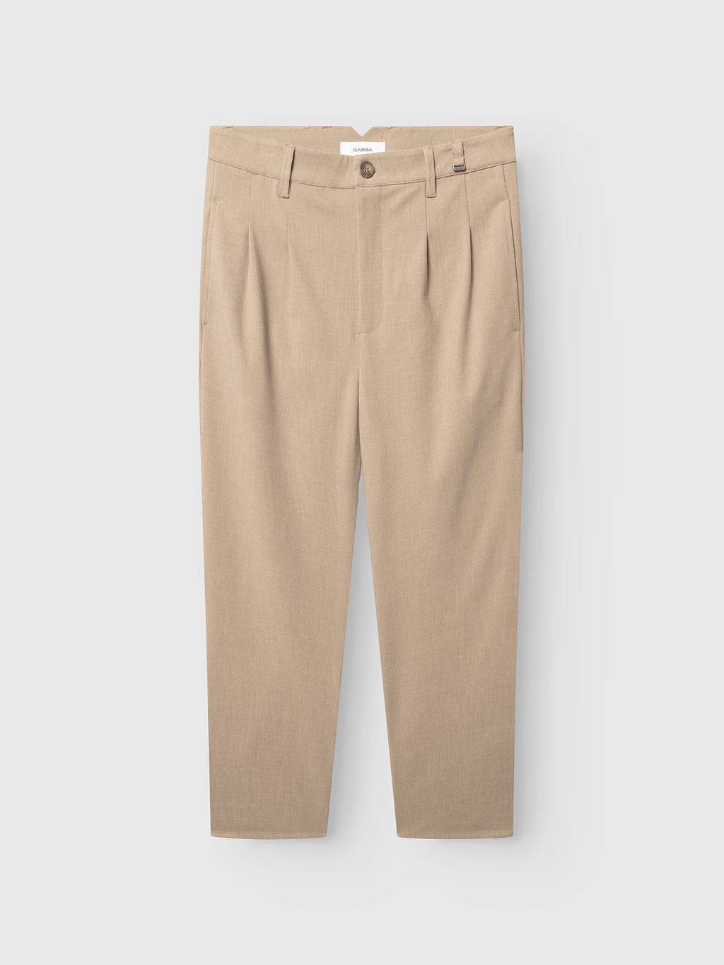The Gabba GABfirenze Phin Cropped GRS - Sand Plaza are beige, straight-leg, regular-fit trousers with belt loops, front pleats, side pockets, and a button closure, shown against a plain white background.