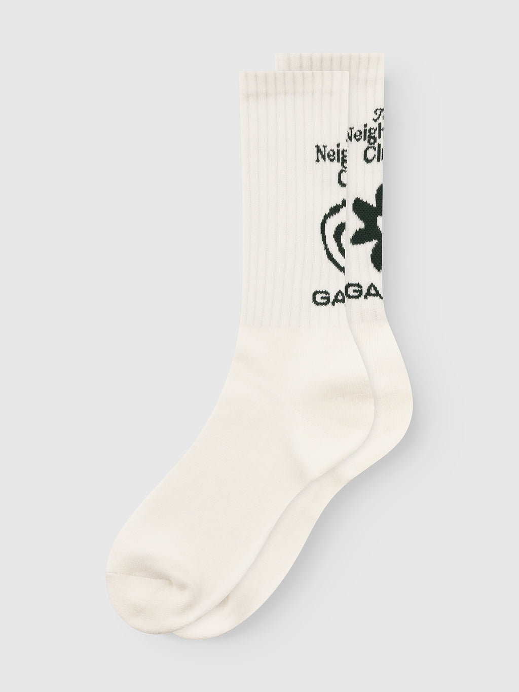 The Gabba GABbrise Socks - White are white cotton-blend socks with black text, a clover design at the top, ribbed cuffs, sporty style, and simple look. They're part of The Neighbour Club collection.
