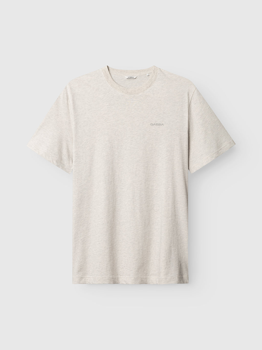 The Gabba GABdune Melange New SS T-Shirt in Lt. Grey Mel features a soft jersey fabric, round neckline, and subtle chest logo, all displayed against a white background for a comfortable, understated look.