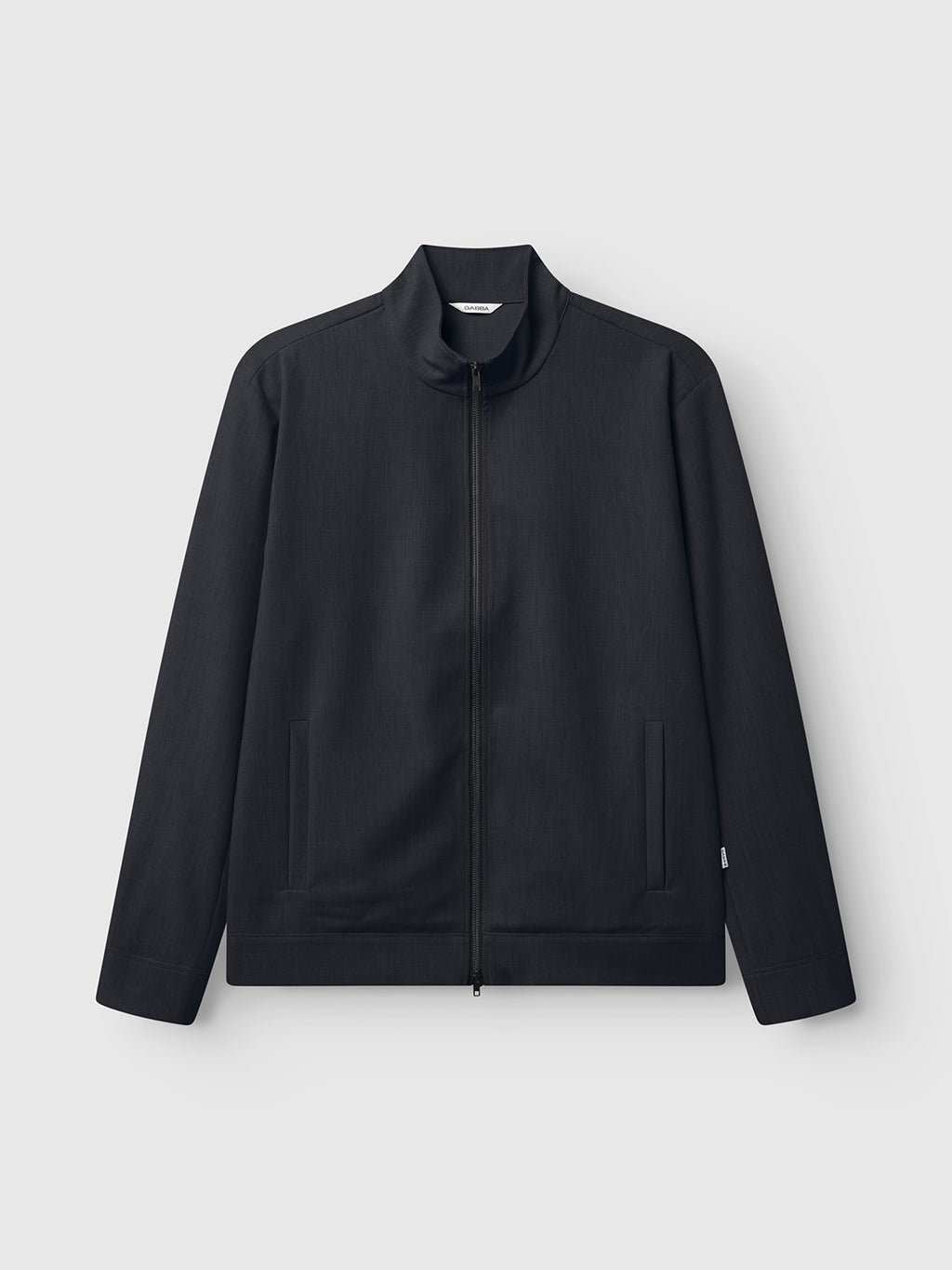 The Gabba GABnik Phin GRS - Blue Black is a minimalist zip-through jacket in recycled polyester with a stand collar and two front pockets, shown against a plain light gray background.