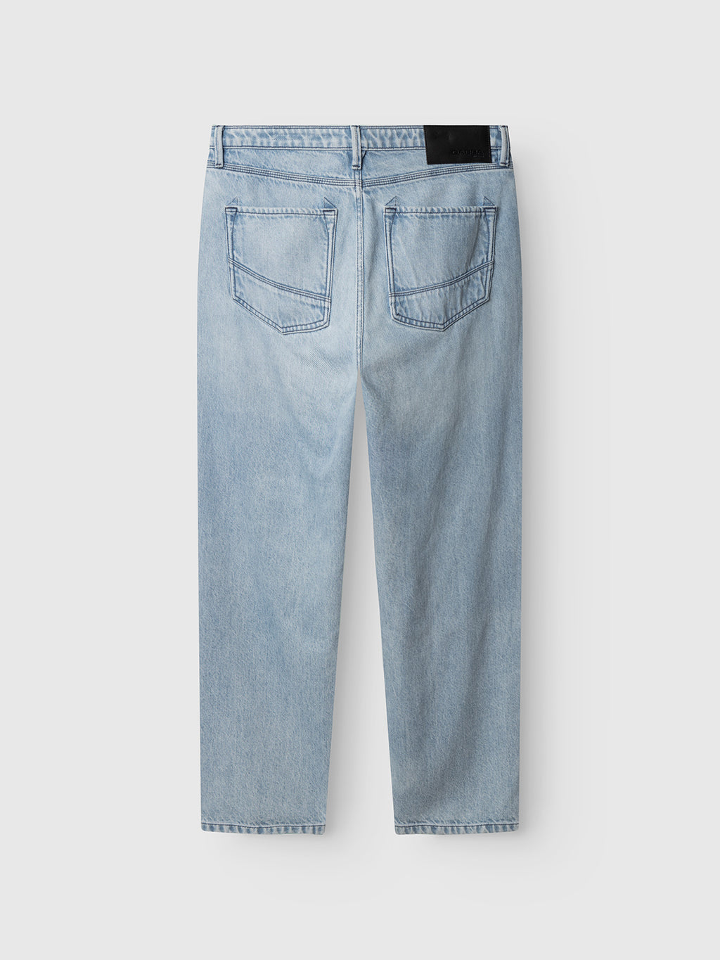 The Gabba GABmax Elvis Jeans in light blue denim feature a relaxed, straight-leg fit, two angled back pockets, and a black waistband patch. Minimal stitching keeps these jeans ideal for everyday style.