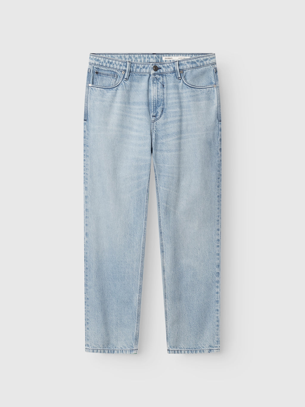 The Gabba GABmax Elvis Jeans in light blue denim feature a straight-leg, relaxed fit, rigid fabric, classic five-pocket style, and button-zip fly closure. Shown laid flat on a white background with minimal fading.