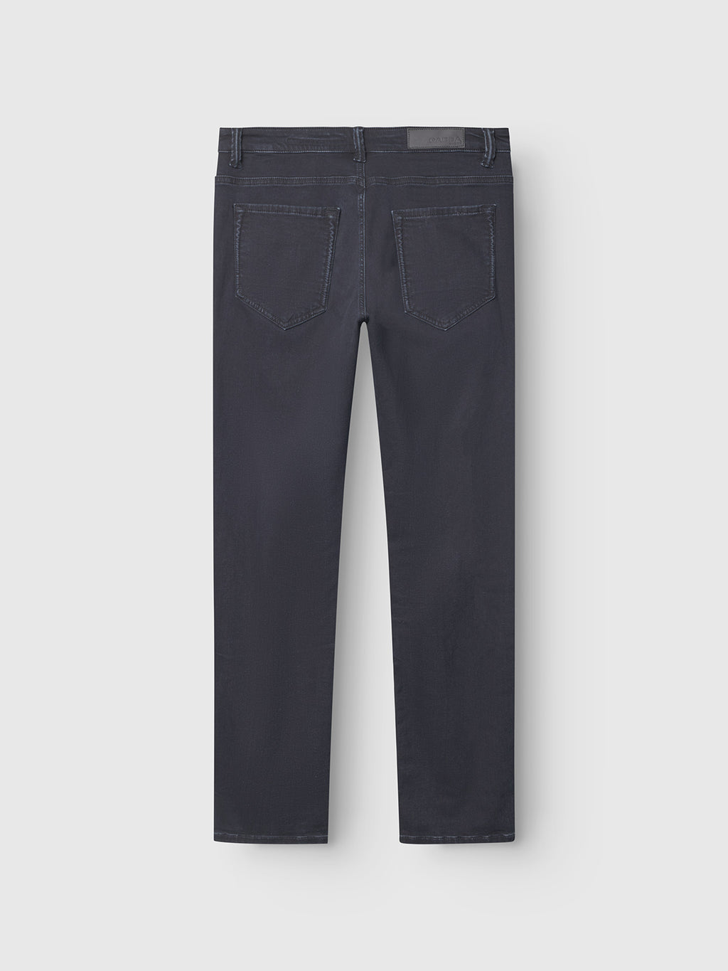 The Gabba GABjones BlueBlack denim jeans in blue-black, shown from the back with a slim straight fit, two rear pockets, belt loops, and a rectangular waistband patch, are displayed flat on a light gray background.