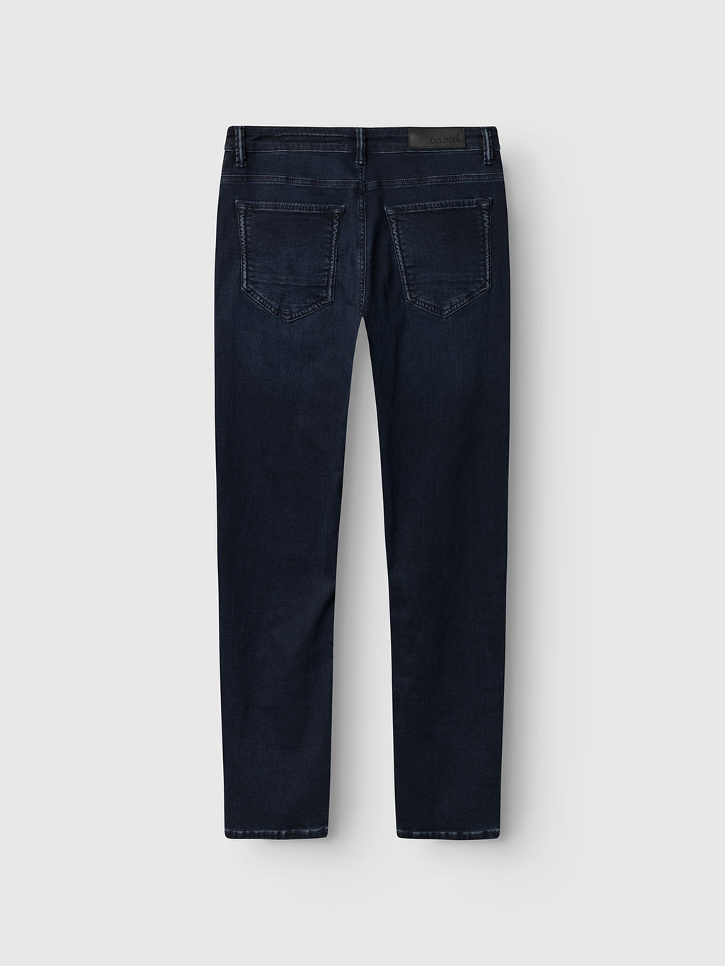 Gabba GABjones Blueblack Jeans in slim straight fit, featuring two back pockets with subtle stitching, belt loops, and a black leather patch. Crafted from blue black denim for all-day comfort. Shown laid flat on a light gray background.