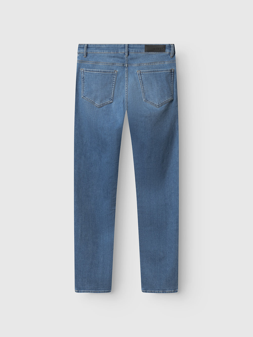 The Gabba GABjones Dhera Jeans in light blue denim are crafted from superstretch fabric and feature a slim straight fit. Shown laid flat on a light background, these jeans display two rear pockets and visible stitching from the back view.