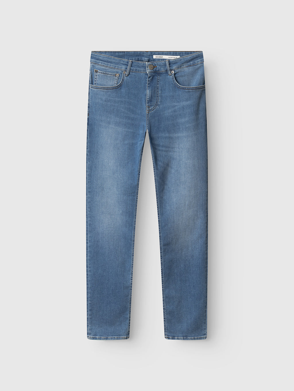 The Gabba GABjones Dhera Jeans in Lt. Blue Denim are laid flat on a white background, showcasing their classic five-pocket design. Crafted from superstretch denim, these jeans offer a slim straight fit and feature both button and zipper closure, with a slightly faded light blue wash on the thighs.