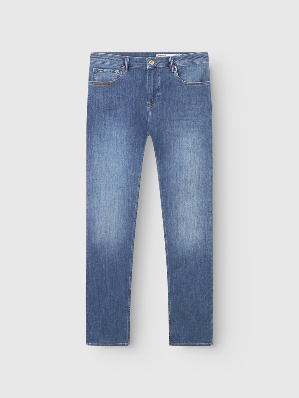 The Gabba GABjones Vanew slim jeans in mid blue denim feature a classic five-pocket design, button and zipper closure, slight thigh fading, and super-stretch fabric for comfort and style. Shown on a plain light background.