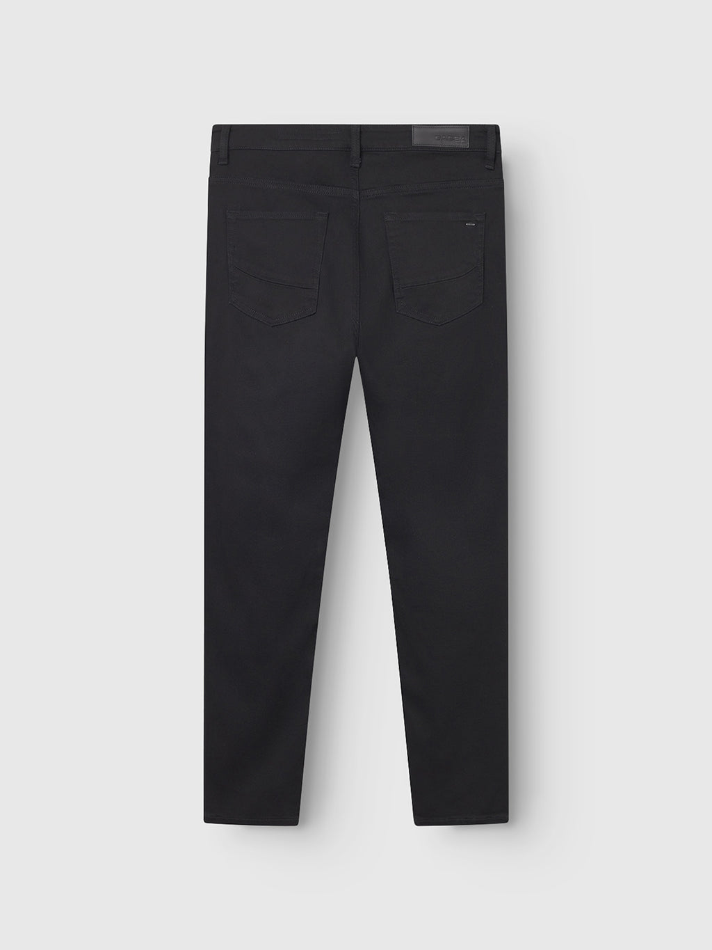 The GABmarc Sword - Black Denim pants by Gabba, shown from the back against a light grey background, feature intense black fabric, two rear pockets, belt loops, and straight legs for a sharp, clean look.