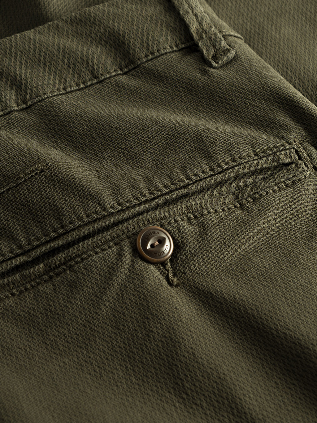 Close-up of the GABBA GABpaul K3280 Dale Chino in Army, highlighting the olive green textured fabric, back pocket with button, stitching details, and modern French pockets.