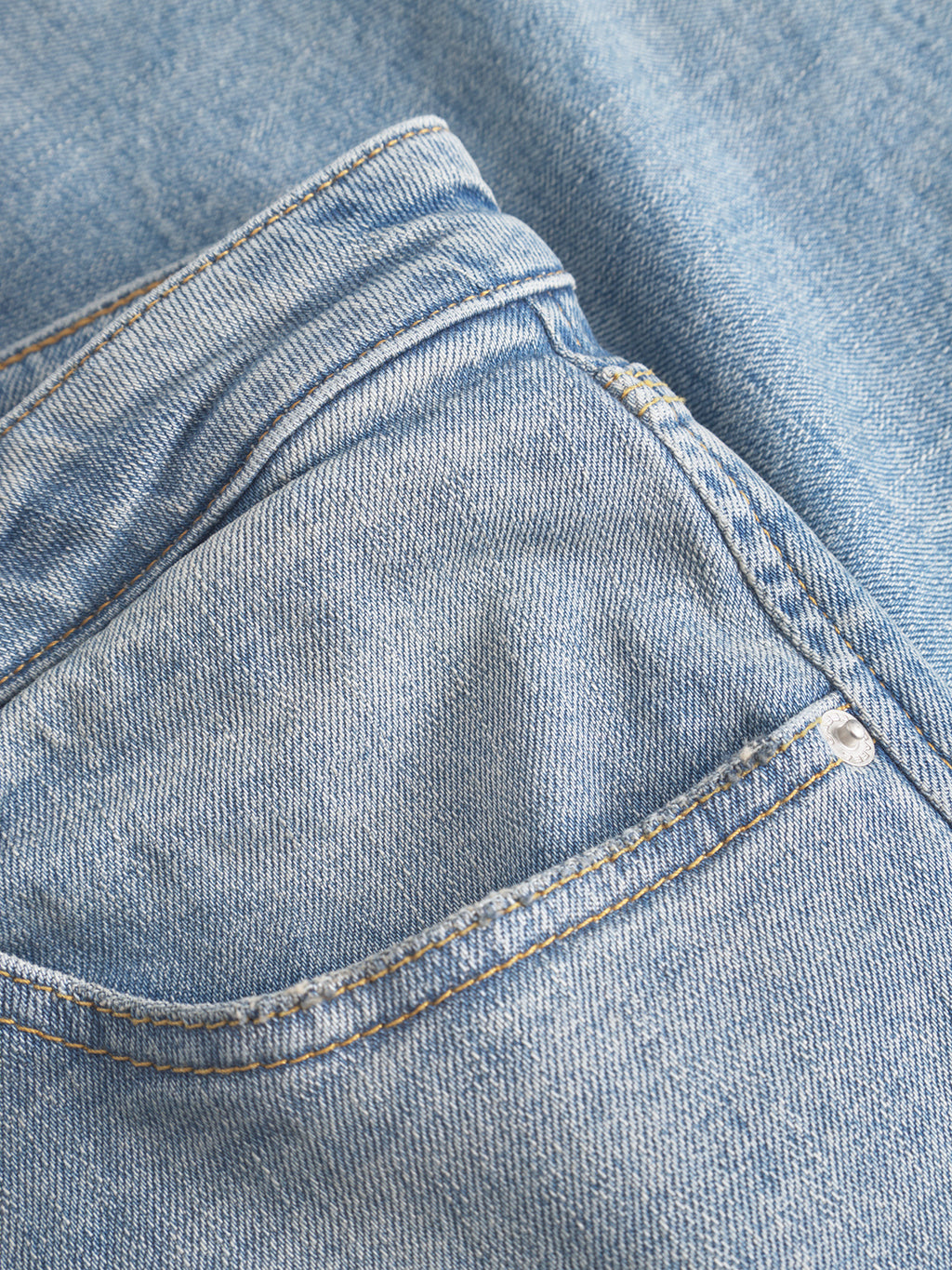 Close-up of the front pocket on Gabba's GABcarl CrosV2 Jeans in light blue denim, showing detailed stitching and fabric texture—demonstrating modern style and quality craftsmanship.