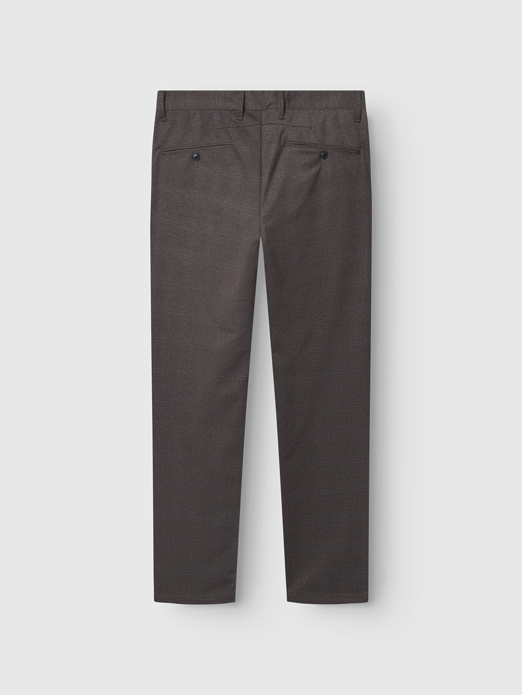 The GABpaul Nygo - Dark Brown chino dress pants by Gabba are shown from the back, featuring two buttoned back pockets. Crafted from a comfort stretch fabric and tailored in a slim chino fit, these versatile pants are laid flat on a light background.