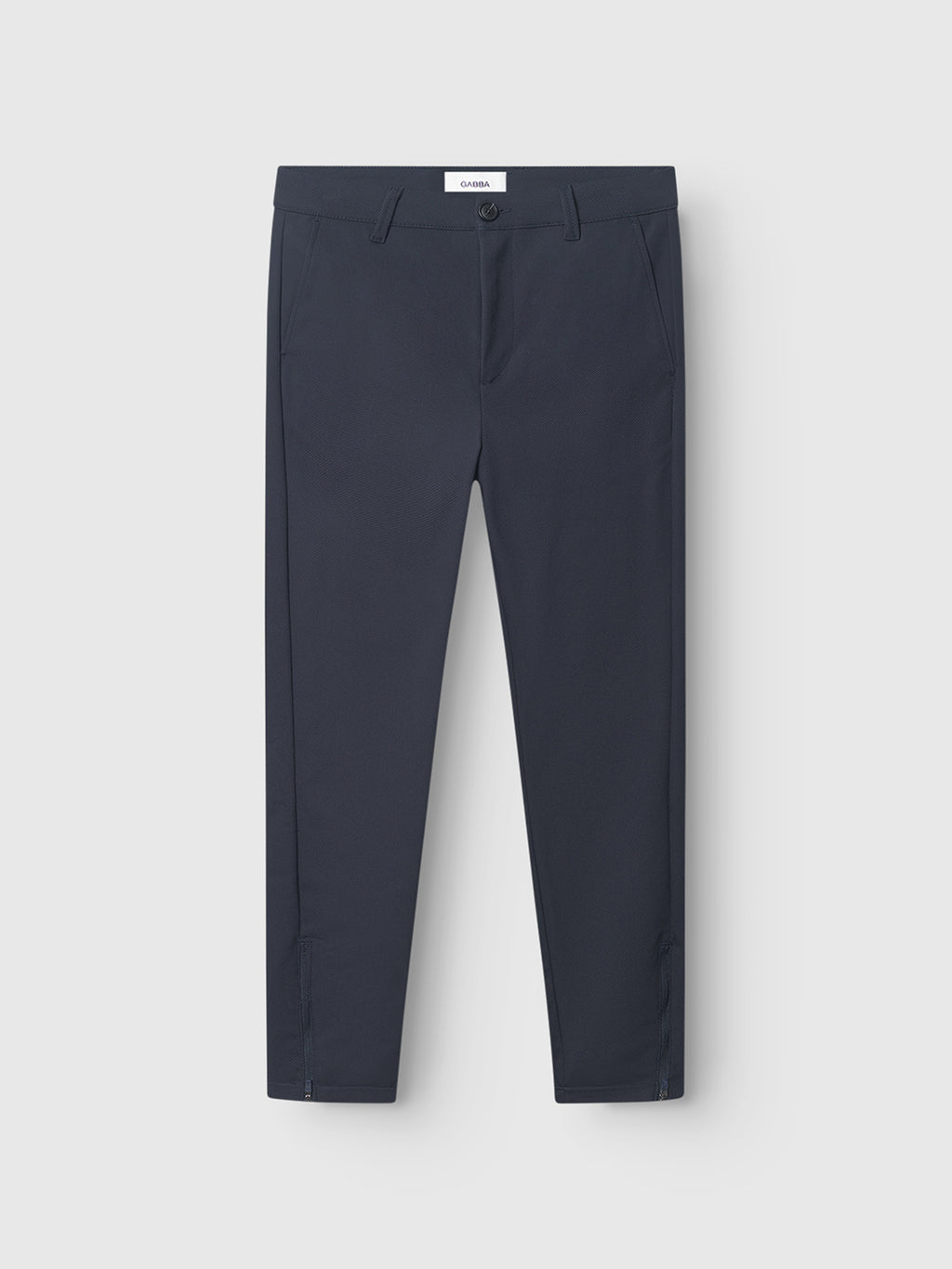 The GABBA Pisa Small Dot - Navy pants feature a metro slim fit in high-stretch cotton-blend, with front pockets and belt loops. Their clean, minimal design is showcased flat against a white background.